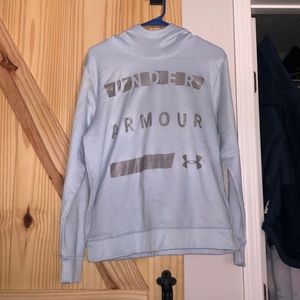 Under Armour baby blue womens hoodie with silver lettering.